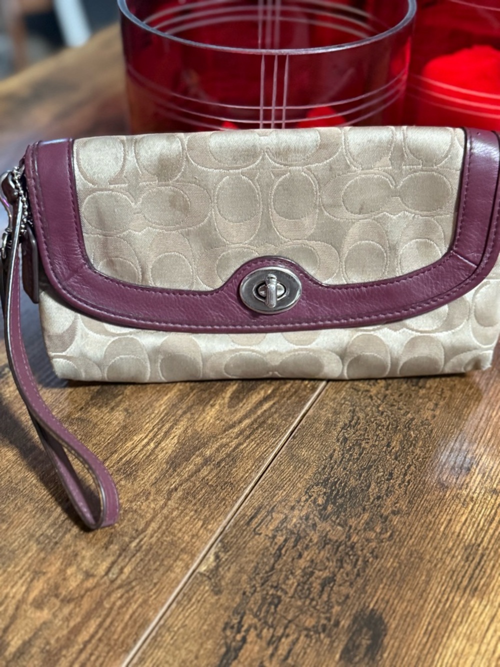 Coach Beige Signature Canvas Wristlet with Plum Leather Trim